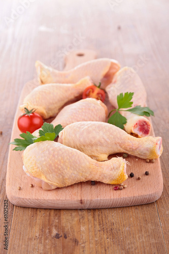 Photo: raw chicken leg raw chicken leg