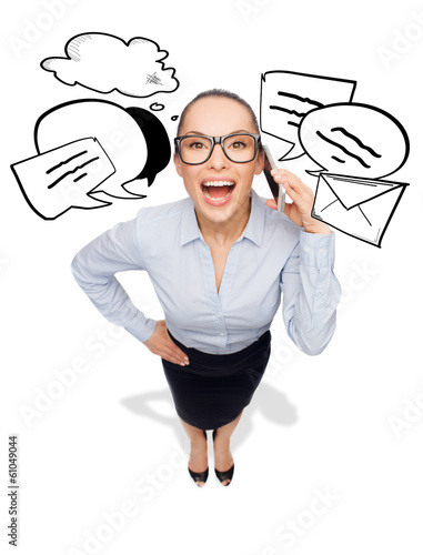 Photo: happy businesswoman in eyeglasses with smartphone happy businesswoman in eyeglasses with smartphone