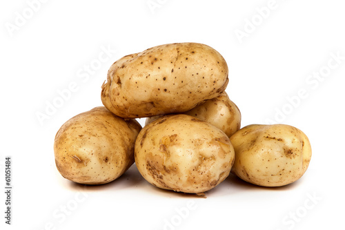 Photo: Group of potatoes isolated on white Group of potatoes isolated on white