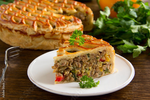 Photo: Homemade pie with meat. Homemade pie with meat.