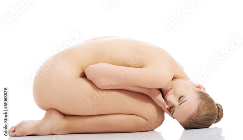 Photo: Beautiful caucasian naked woman sitting with fresh clean skin. Beautiful caucasian naked woman sitting with fresh clean skin.