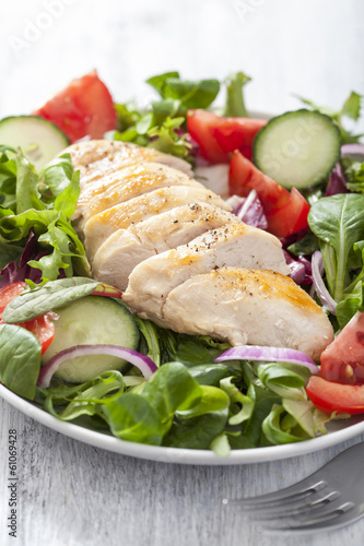Photo: chicken salad with tomatoes and cucumber chicken salad with tomatoes and cucumber