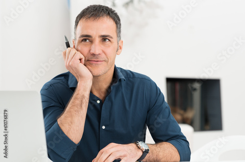 Photo: Mature Man Thinking Mature Man Thinking