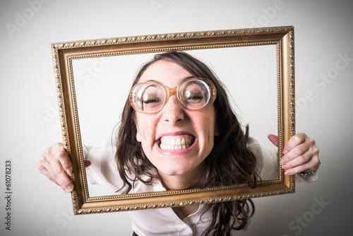 Photo: beautiful young businesswoman through ledge beautiful young businesswoman through ledge