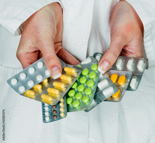 Photo: doctor prescribes a drug doctor prescribes a drug