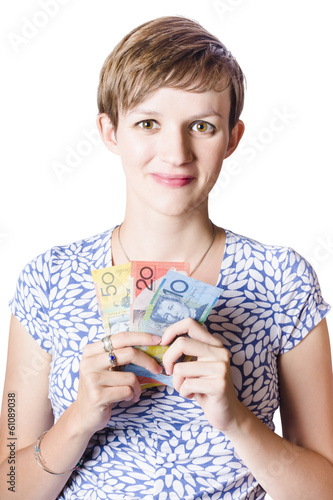 Photo: Happy woman holding Australian money Happy woman holding Australian money