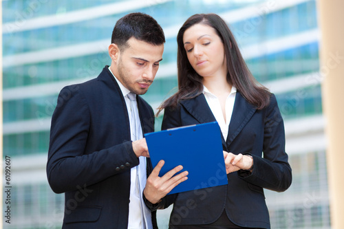 Photo: Business people talking Business people talking