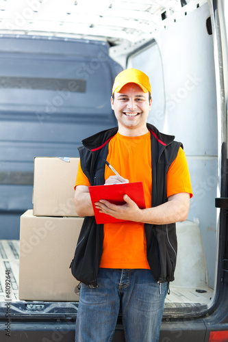 Photo: Young delivery man portrait Young delivery man portrait