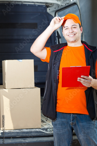 Photo: Young delivery man portrait Young delivery man portrait