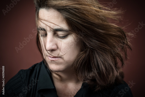 Photo: Portrait of a sad adult hispanic woman Portrait of a sad adult hispanic woman