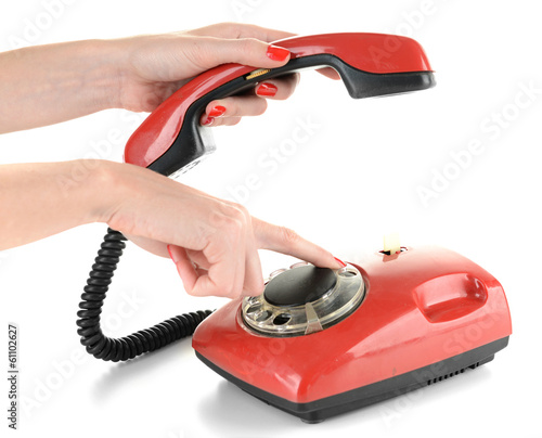 Photo: Red retro telephone, isolated on white Red retro telephone, isolated on white