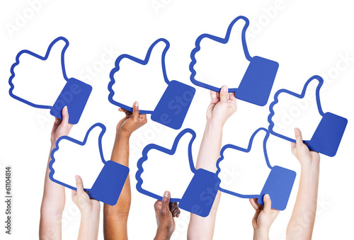 Photo: Multi-Ethnic Group of People Holding Symbol Multi-Ethnic Group of People Holding Symbol