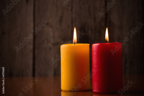 Photo: candles on old wooden background candles on old wooden background