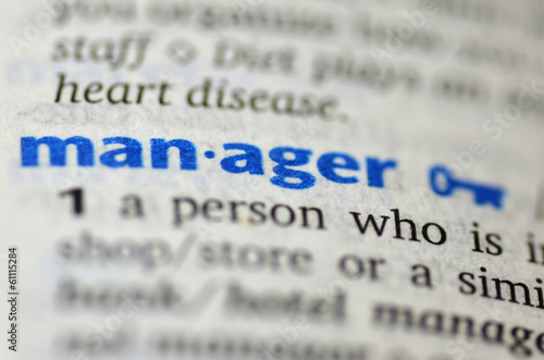 Photo: Manager word on book Manager word on book