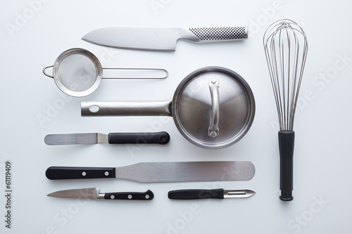 Photo: Professional kitchen utensils on white background Professional kitchen utensils on white background