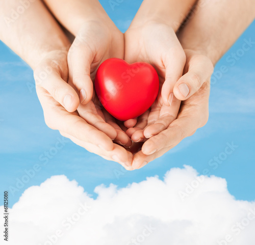 Photo: woman and man hands with heart woman and man hands with heart