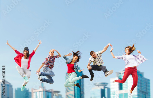 Photo: group of teenagers jumping group of teenagers jumping