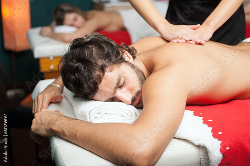 Photo: Couple having a massage Couple having a massage
