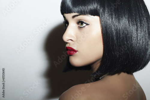 Photo: Beautiful Brunette Girl. Healthy Black Hair. bob Haircut Beautiful Brunette Girl. Healthy Black Hair. bob Haircut