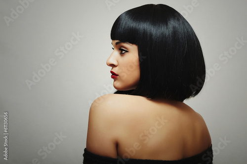 Photo: Sexy Back of Beautiful Brunette Woman with bob Haircut. Sexy Back of Beautiful Brunette Woman with bob Haircut.