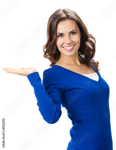 Photo: Beautiful young woman showing, on white Beautiful young woman showing, on white