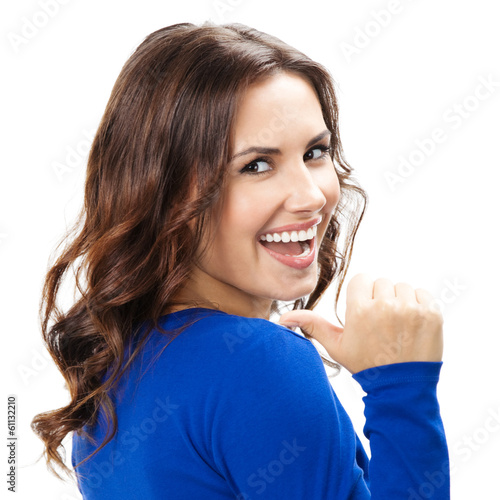 Photo: Woman showing thumbs up gesture, isolated Woman showing thumbs up gesture, isolated