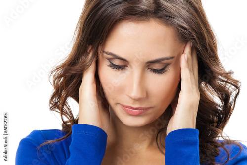 Photo: Thinking, tired or ill with headache young woman Thinking, tired or ill with headache young woman