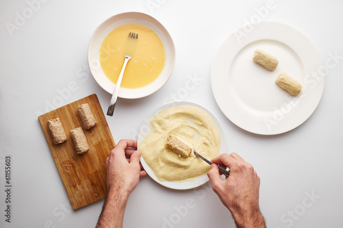 Photo: Cook's hands preparing croquettes Cook's hands preparing croquettes