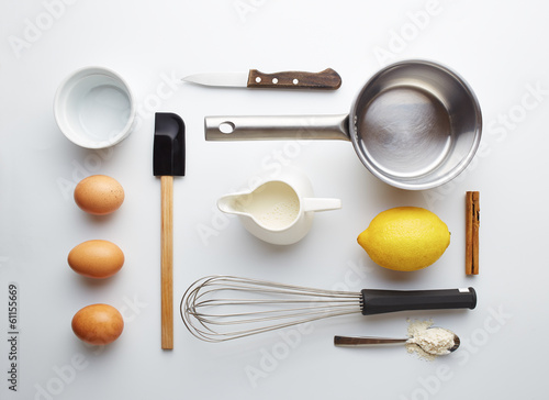 Photo: Creme brulee ingredients on yellow background Creme brulee ingredients on yellow background