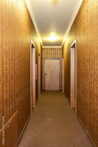 Photo: Long vintage hotel corridor Long vintage hotel corridor