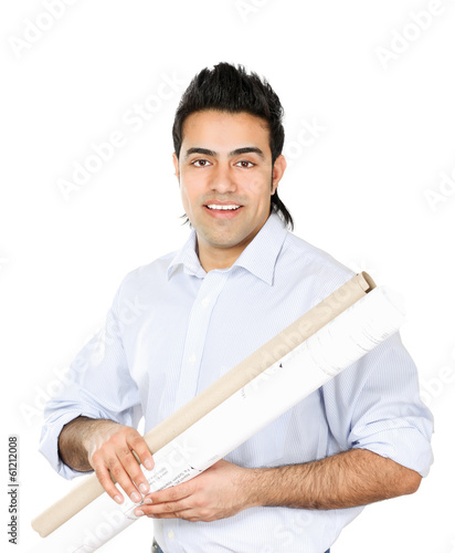 Photo: young businessman comparing something with drafts young businessman comparing something with drafts