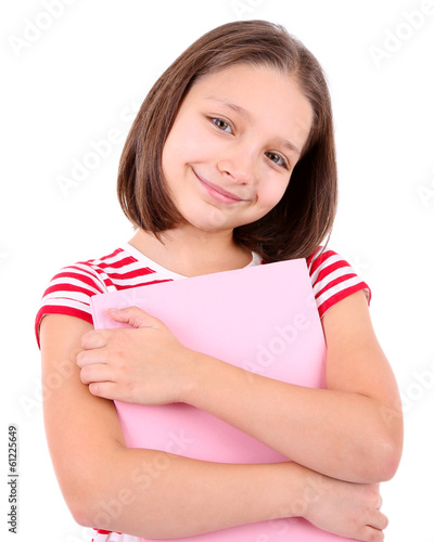 Photo: Beautiful little girl with book, isolated on white Beautiful little girl with book, isolated on white