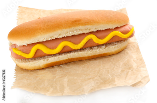 Photo: Tasty hot dog isolated on white Tasty hot dog isolated on white