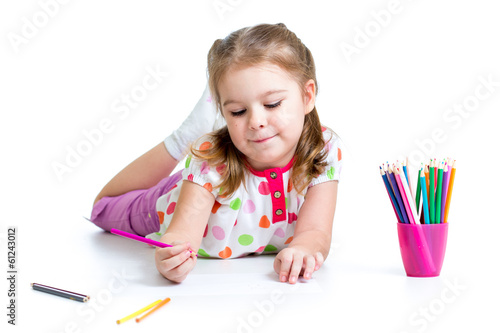 Photo: kid girl drawing with pencils kid girl drawing with pencils