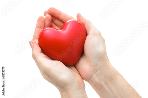 Photo: Heart in the hands isolated Heart in the hands isolated