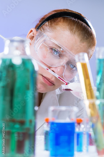 Photo: woman with test tubes in a chemistry woman with test tubes in a chemistry