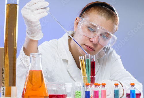 Photo: woman with test tubes in a chemistry woman with test tubes in a chemistry
