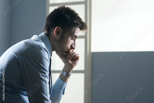 Photo: Tired pensive businessman Tired pensive businessman