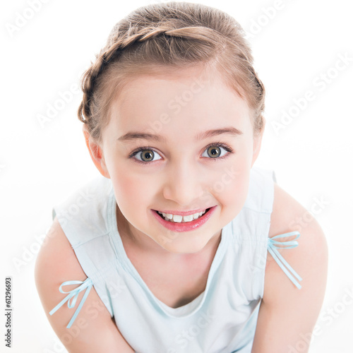 Photo: Closeup portrait of a cute happy little girl. Closeup portrait of a cute happy little girl.