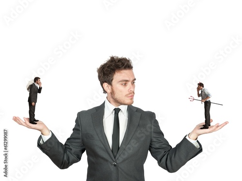 Photo: Businessman and angel or devil Businessman and angel or devil