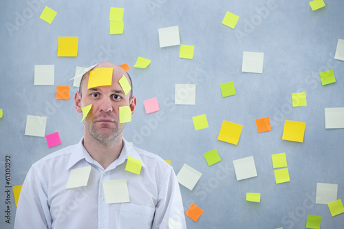 Photo: businessman with many notes businessman with many notes