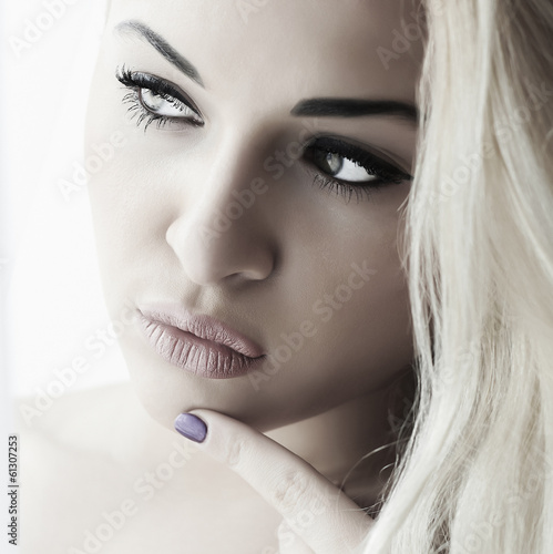 Photo: Beautiful Face of Young Blond Woman. Beauty Portrait. Daylight Beautiful Face of Young Blond Woman. Beauty Portrait. Daylight