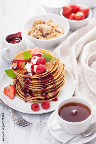 Photo: pancakes with berry and jam for breakfast pancakes with berry and jam for breakfast