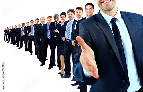 Photo: Business group in a row. leader with open hand Business group in a row. leader with open hand