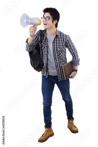 Photo: Man shouting through megaphone Man shouting through megaphone