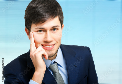 Photo: Smiling young businessman Smiling young businessman
