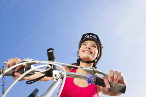 Photo: Mountain biking - portrait of young mountain biker Mountain biking - portrait of young mountain biker
