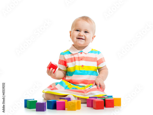 Photo: child playing with block toys child playing with block toys
