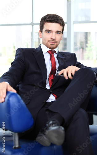 Photo: Happy smart business man Happy smart business man