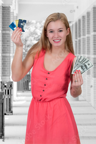 Photo: Woman Holding 100 Dollar Bills and Credit cards Woman Holding 100 Dollar Bills and Credit cards